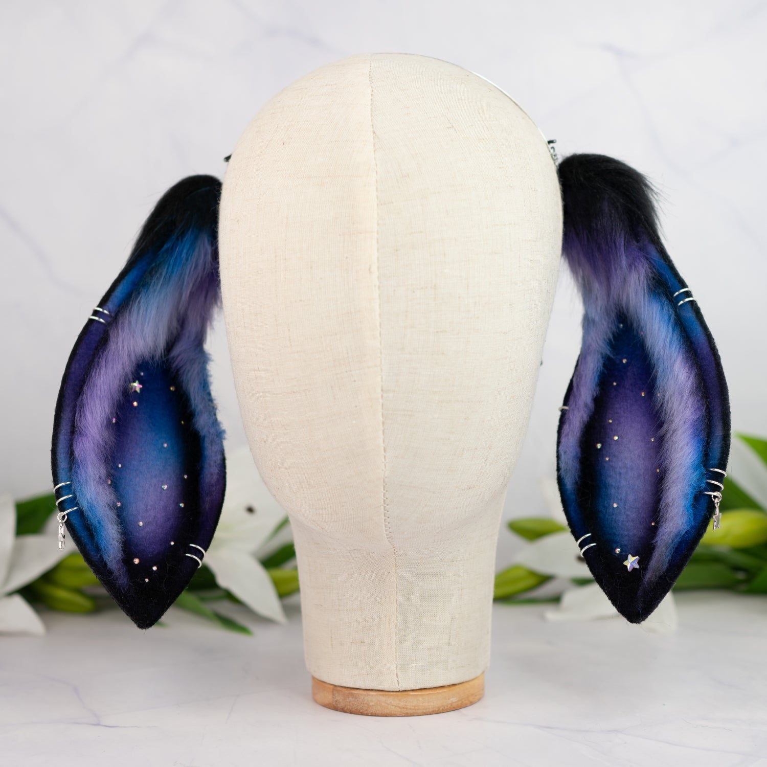 Purple/blue galaxy lop bunny ears