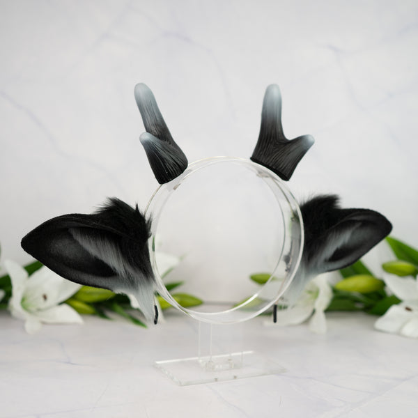 Black deer ears with antlers