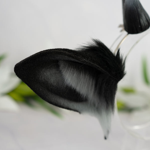Black deer ears with antlers