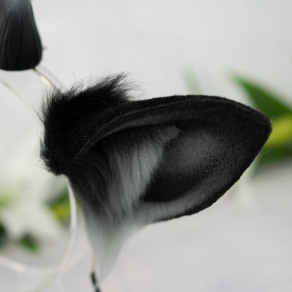 Black deer ears with antlers