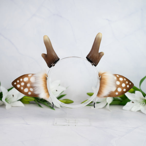 Spotted deer ears with antlers