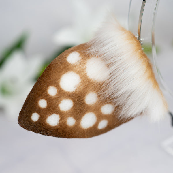 Spotted deer ears with antlers