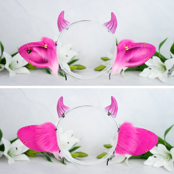 Pink cow ears with Piercings