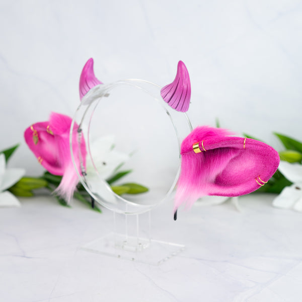 Pink cow ears with Piercings