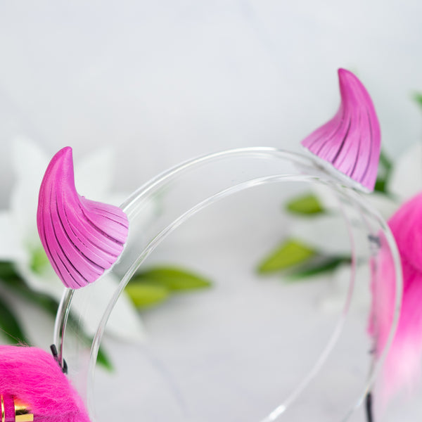 Pink cow ears with Piercings