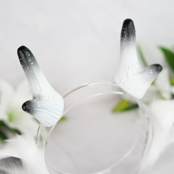 Snow deer ears with antlers